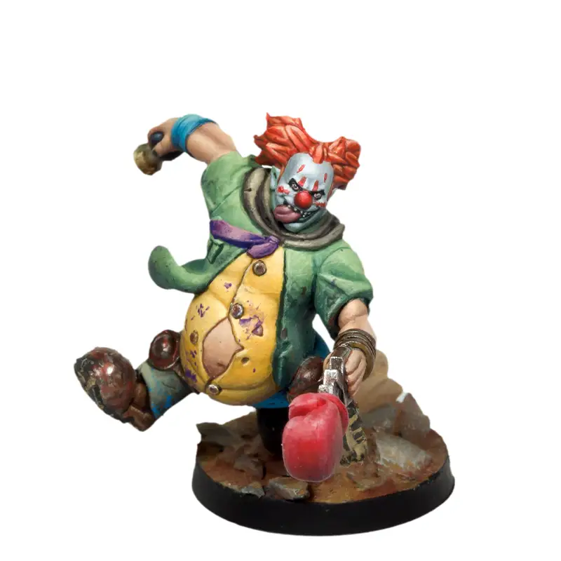 Pachacho con pistola/guante de boxeo y monociclo